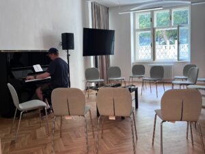 Dom hudby, zážitkový workshop. Pianista